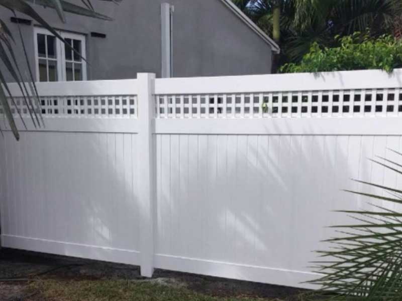 Vinyl Fence or Wood Fence for your Dog and Privacy for your home.